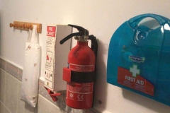 Fire extinguisher, fire blanket and first aid cabinet